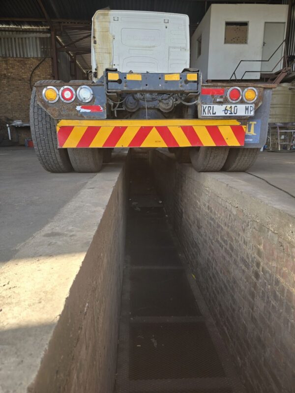 HGV on the inspection pit at our Johannesburg workshop